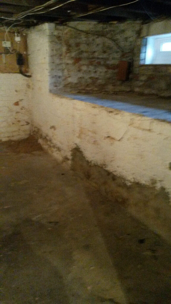 Cellar Conversion Front-Lounge Pre-Conversion Photo in Manchester