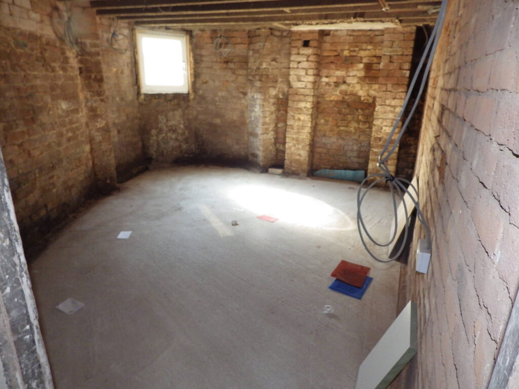 Cellar Conversion Bedroom Before Photo in Manchester