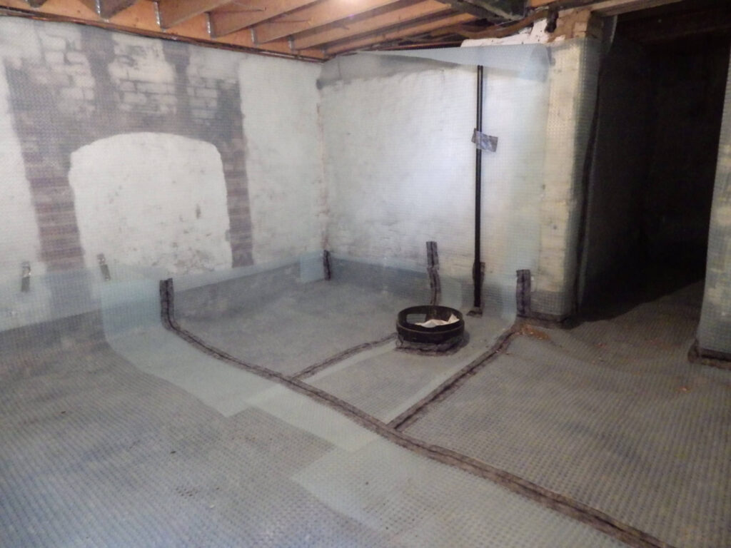 Cellar Conversion into Bedroom Tanking Photo in Manchester